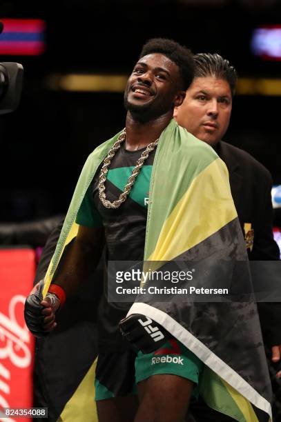 Aljamain Sterling reacts after defeating Renan Barao of Brazil in their 140-pound catchweight bout during the UFC 214 event at Honda Center on July...