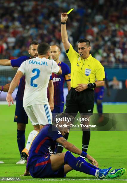 Neymar of Barcelona reacts to a foul in the first half against the Real Madrid during their International Champions Cup 2017 match at Hard Rock...