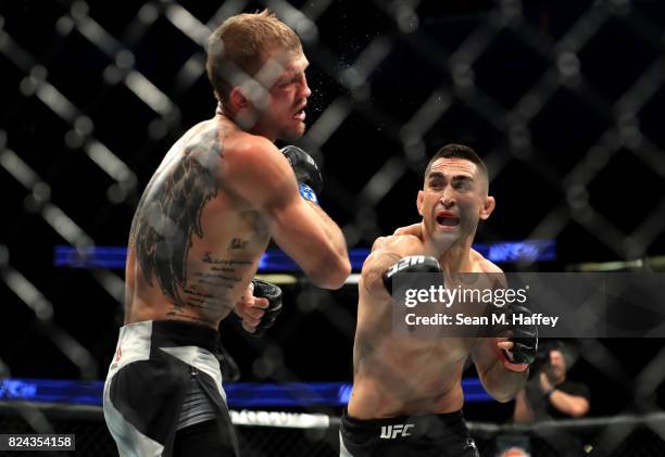 Ricardo Lamas fights Jason Knight during their Featherweight bout at UFC 214 at Honda Center on July 29, 2017 in Anaheim, California.