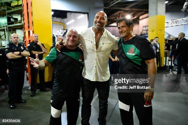 Matt Serra, The Rock and Ray Longo pose for a photo backstage during the UFC 214 event inside the Honda Center on July 29, 2017 in Anaheim,...