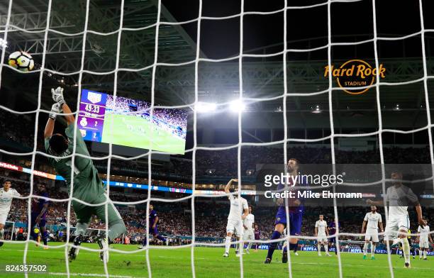 Gerard Pique of Barcelona scores a goal in the second half against Real Madrid during their International Champions Cup 2017 match at Hard Rock...
