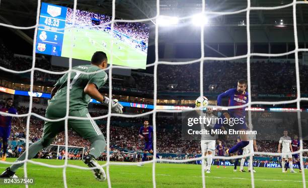 Gerard Pique of Barcelona scores a goal in the second half against Real Madrid during their International Champions Cup 2017 match at Hard Rock...