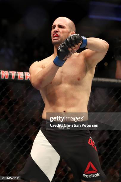 Volkan Oezdemir of Switzerland reacts after knocking out Jimi Manuwa in their light heavyweight bout during the UFC 214 event at Honda Center on July...