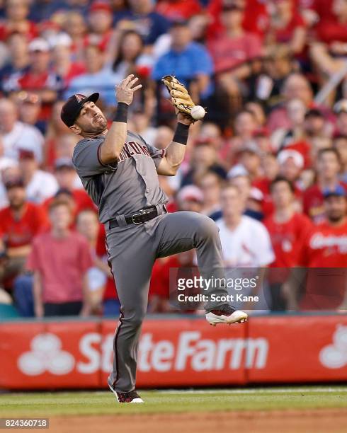 Daniel Descalso of the Arizona Diamondbacks is unable to make a play during the sixth inning against the St. Louis Cardinals at Busch Stadium on July...