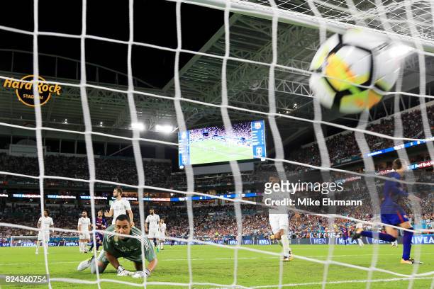 Gerard Pique of Barcelona scores a goal in the second half against Real Madrid during their International Champions Cup 2017 match at Hard Rock...