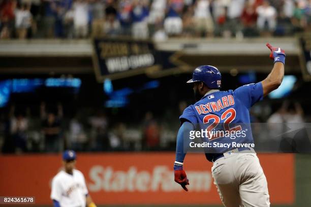 Jason Heyward of the Chicago Cubs hits a solo home run during the eleventh inning of a game against the Milwaukee Brewers at Miller Park on July 29,...