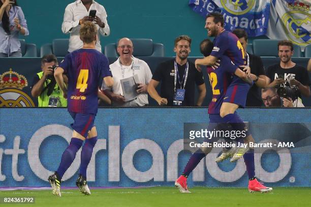 Lionel Messi of FC Barcelona celebrates after scoring a goal to make it 0-1 during the International Champions Cup 2017 match between Real Madrid and...