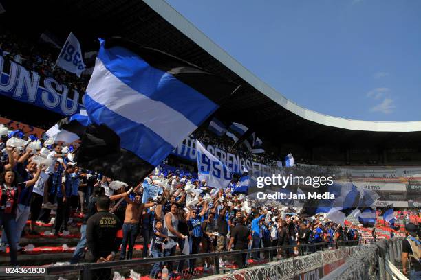 Fans of Queretaro cheer for their team during the 2nd round match between Queretaro and Lobos BUAP as part of the Apertura Tournament 2017 league...