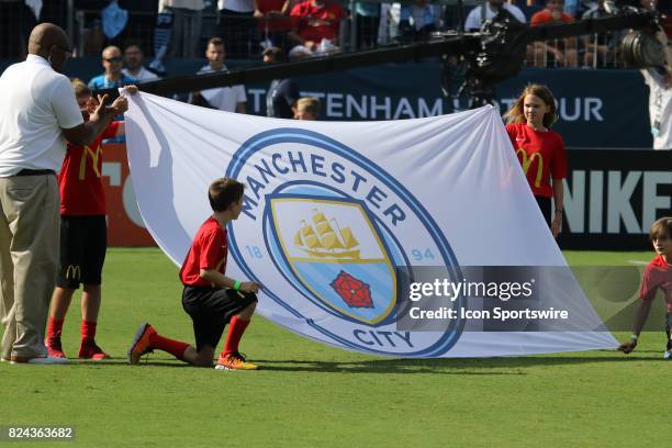 The Manchsester City flag is displayed before the game between Manchester City and Tottenham Hotspur. Manchester City defeated Tottenham by the score...