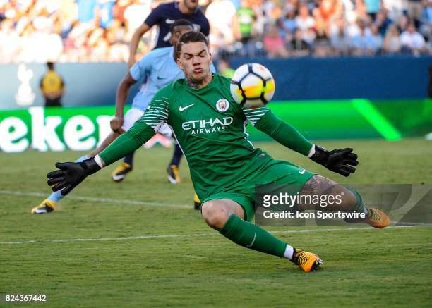 Manchester City goalkeeper Ederson Moraes deflects the shot of Tottenham Hotspur forward Vincent Janssen during the second half of a International...
