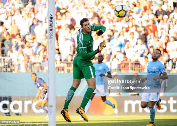 Tottenham Hotspur forward Kyle Walker-Peters takes a shot on Manchester City goalkeeper Aro Muric during the second half of a International Champions...