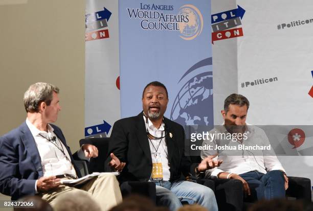 Moderator Terry McCarthy, Malcolm Nance, and Bassem Youssef at 'LA World Affairs Council Presents: Mid-East Mess' panel during Politicon at Pasadena...