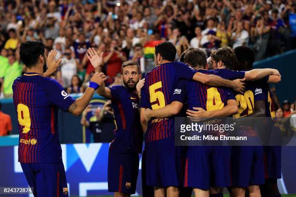 Barcelona celebrate a goal in the second half against Real Madrid during their International Champions Cup 2017 match at Hard Rock Stadium on July...