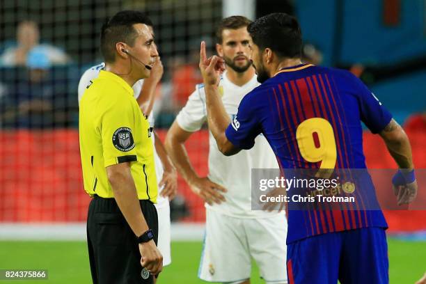Luis Suarez of Barcelona argues a call during their International Champions Cup 2017 match against Real Madrid at Hard Rock Stadium on July 29, 2017...