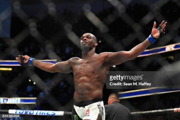 Jon Jones reacts to defeating Daniel Cormier in the Light Heavyweight title bout during UFC 214 at Honda Center on July 29, 2017 in Anaheim,...