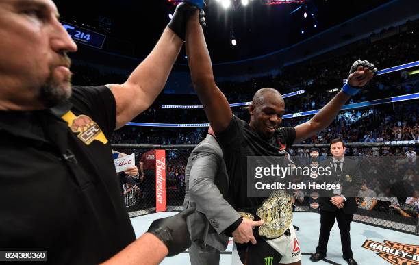 Jon Jones celebrates after defeating Daniel Cormier to win the UFC light heavyweight championship during the UFC 214 event at Honda Center on July...