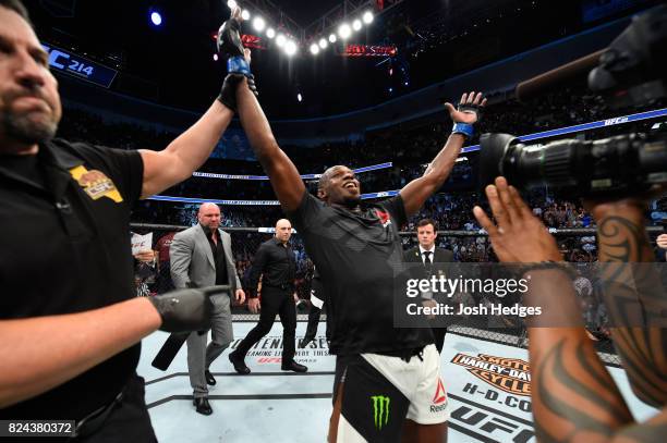 Jon Jones celebrates after defeating Daniel Cormier to win the UFC light heavyweight championship during the UFC 214 event at Honda Center on July...