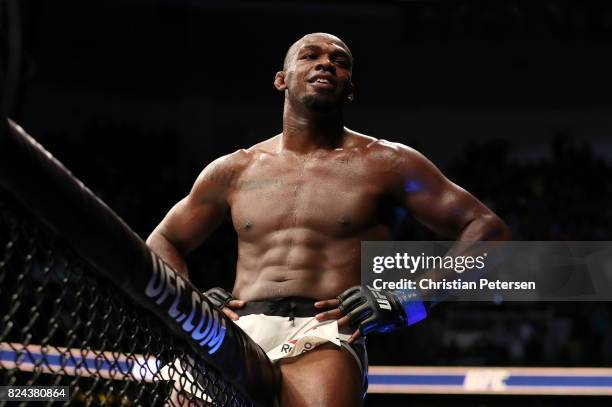 Jon Jones celebrates after his knockout victory over Daniel Cormier in their UFC light heavyweight championship bout during the UFC 214 event at...