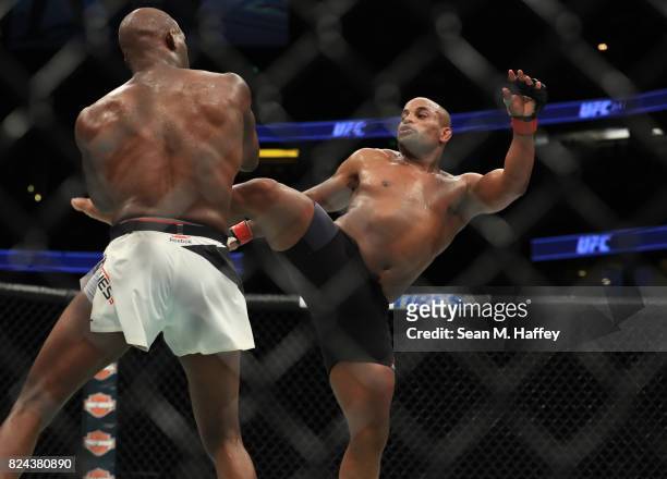 Daniel Cormier kicks Jon Jones during the UFC 214 event at Honda Center on July 29, 2017 in Anaheim, California.
