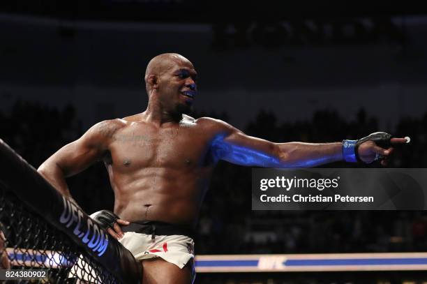 Jon Jones celebrates after his knockout victory over Daniel Cormier in their UFC light heavyweight championship bout during the UFC 214 event at...