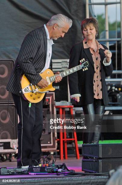 Pat Benatar and Neil Giraldo perform at the 2017 Quick Chek New Jersey Festival Of Ballooning at Solberg Airport on July 29, 2017 in Readington, New...