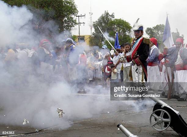 Mock French Army fires small cannons during a reenactment of the 1862 battle between the French and the Zacapuaxtlas Indians as Mexicans celebrate...