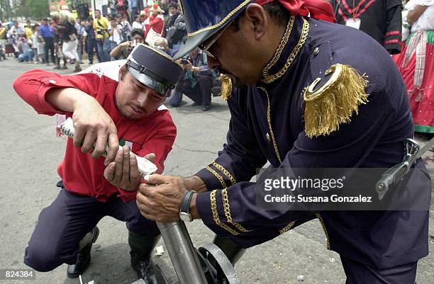 Mock French Army prepares to fire small cannons during a reenactment of the 1862 battle between the French and the Zacapuaxtlas Indians as Mexicans...