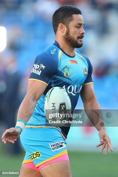 Jarryd Hayne of the Titans warms up before the round 21 NRL match between the Gold Coast Titans and the Wests Tigers at Cbus Super Stadium on July...