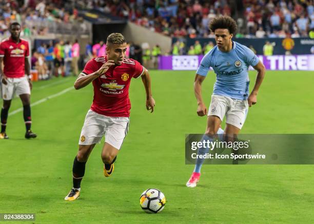 Manchester United midfielder Andreas Pereira and Manchester City midfielder Leroy Sané race for the ball during the International Champions Cup match...