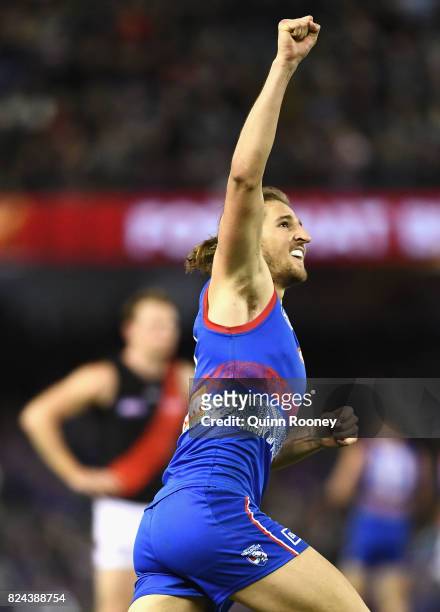 Marcus Bontempelli of the Bulldogs celebrates kicking a goal during the round 19 AFL match between the Western Bulldogs and the Essendon Bombers at...