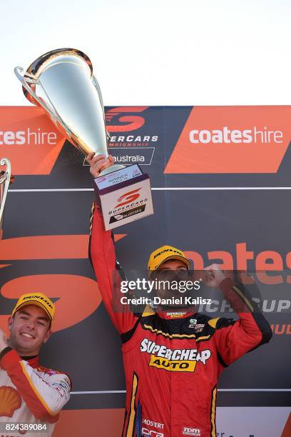 Chaz Mostert driver of the Supercheap Auto Racing Ford Falcon FGX celebrates after winning during race 16 for the Ipswich SuperSprint, which is part...