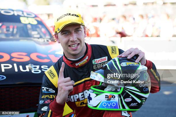 Chaz Mostert driver of the Supercheap Auto Racing Ford Falcon FGX celebrates after winning during race 16 for the Ipswich SuperSprint, which is part...