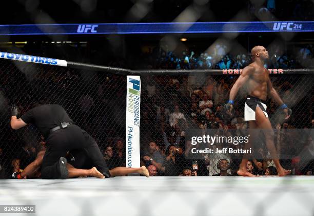 Jon Jones celebrates after defeating Daniel Cormier in their UFC light heavyweight championship bout during the UFC 214 event inside the Honda Center...