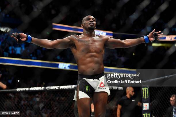Jon Jones celebrates after defeating Daniel Cormier in their UFC light heavyweight championship bout during the UFC 214 event inside the Honda Center...
