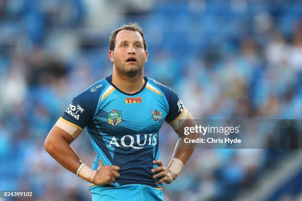 Tyrone Roberts of the Titans looks on during the round 21 NRL match between the Gold Coast Titans and the Wests Tigers at Cbus Super Stadium on July...