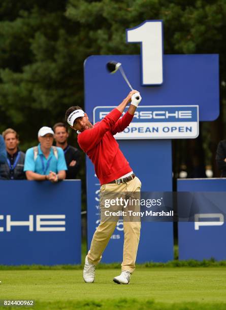 Eduardo De La Riva of Spain plays his first shot on the 1st tee during the Porsche European Open - Day Four at Green Eagle Golf Course on July 30,...