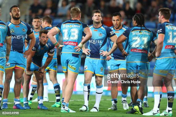 Titans look on during the round 21 NRL match between the Gold Coast Titans and the Wests Tigers at Cbus Super Stadium on July 30, 2017 in Gold Coast,...