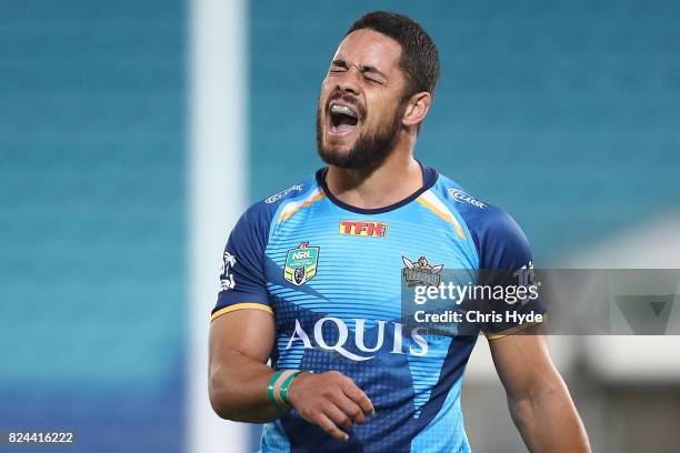 Jarryd Hayne of the Titans reacts during the round 21 NRL match between the Gold Coast Titans and the Wests Tigers at Cbus Super Stadium on July 30,...