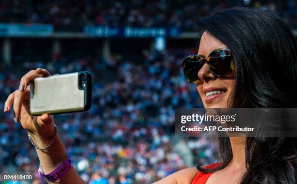 Linda Pizzuti Henry, managing director of the Boston Globe newspaper and wife of US businessman and co-owner of Liverpool FC John Henry, shoots a...