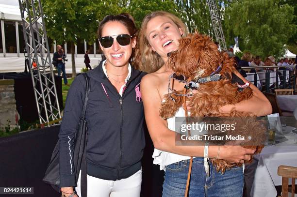 Jessica Springsteen and Hilary McNerney with dog Happy during the Global Jumping at Longines Global Champions Tour at Sommergarten unter dem Funkturm...