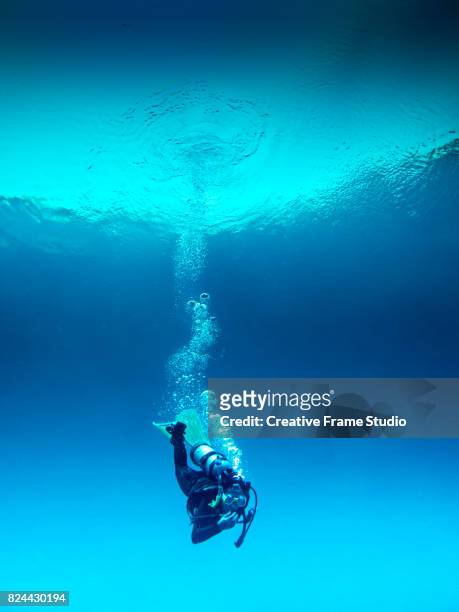 scuba diver decompressing during the immersion - the deep stock pictures, royalty-free photos & images