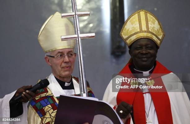Archbishop of Canterbury, Justin Welby , and Ezekiel Kondo Kumir Kuku, Sudan's newly appointed first archbishop, attend a ceremony in Khartoum's All...