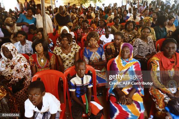 Sudanese Christians attend a ceremony led by the Archbishop of Canterbury at Khartoum's All Saints Cathedral on July 30, 2017. Archbishop of...