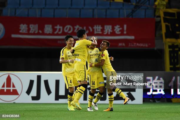 Junya Ito of Kashiwa Reysol celebrates scoring the opening goal with his team mates during the J.League J1 match between Vegalta Sendai and Kashiwa...