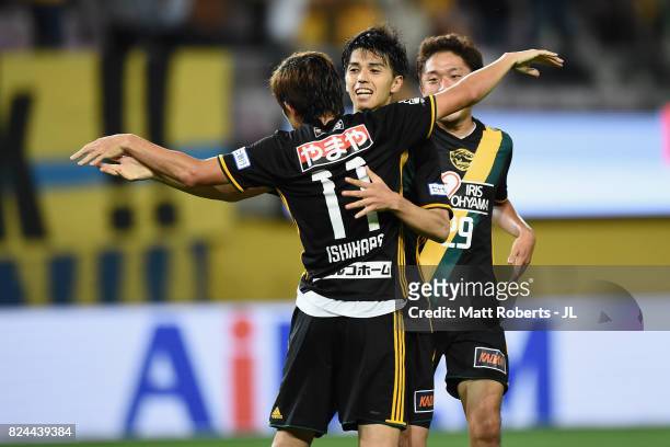 Yoshihiro Nakano of Vegalta Sendai celebrates scoring his side's first goal with his team mates during the J.League J1 match between Vegalta Sendai...