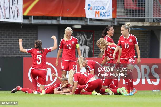 Theresa Nielsen of Denmark celebrates scoring her sides second goal with her Denmark team mates during the UEFA Women's Euro 2017 Quarter Final match...