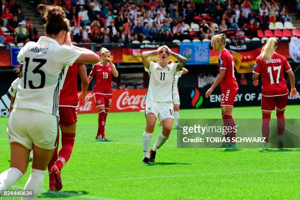 Germany's forward Anja Mittag reacts during the quarter final match of the UEFA Women's Euro 2017 football tournament between Germany and Denmark at...
