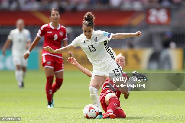 Sanne Troelsgaard Nielsen of Denmark fouls Sara Dabritz of Germany during the UEFA Women's Euro 2017 Quarter Final match between Germany and Denmark...