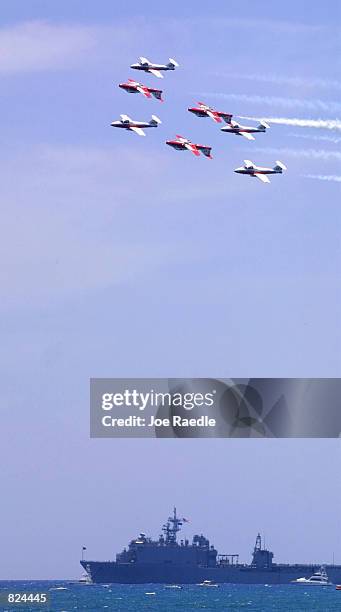 The Canadian Snowbird team performs aerobatic maneuvers May 6, 2001 on day two of the two-day Air & Sea Show's salute to the U.S. Military in Ft....