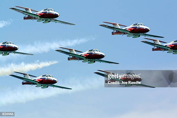 The Canadian Snowbird team performs aerobatic maneuvers May 6, 2001 on day two of the two-day Air & Sea Show's salute to the U.S. Military in Ft....